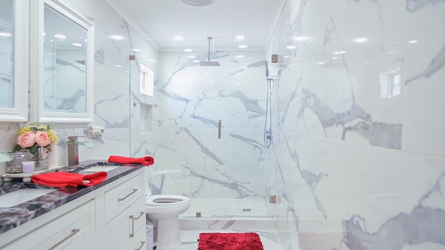 full bathroom featuring vanity, ornamental molding, a marble finish shower, and toilet