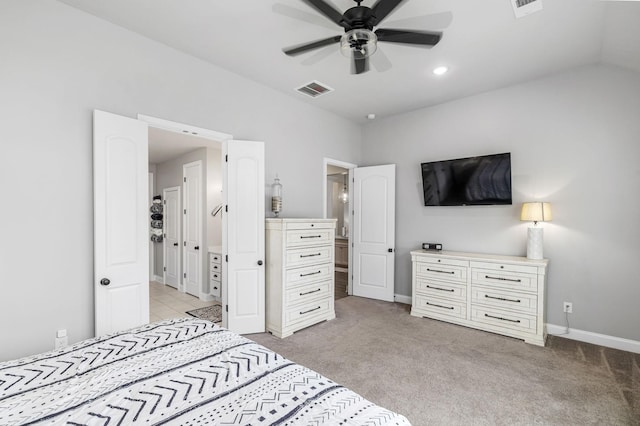 bedroom featuring a ceiling fan, visible vents, light carpet, and baseboards