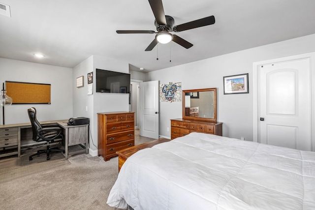 bedroom featuring carpet floors, visible vents, baseboards, and a ceiling fan