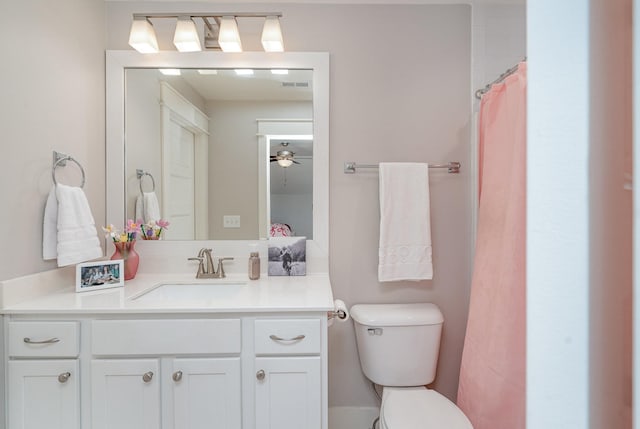 full bath with visible vents, ensuite bath, vanity, and toilet