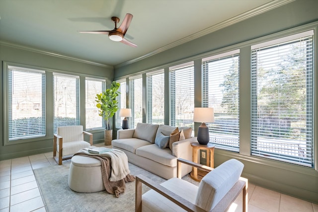 sunroom featuring a ceiling fan and a wealth of natural light