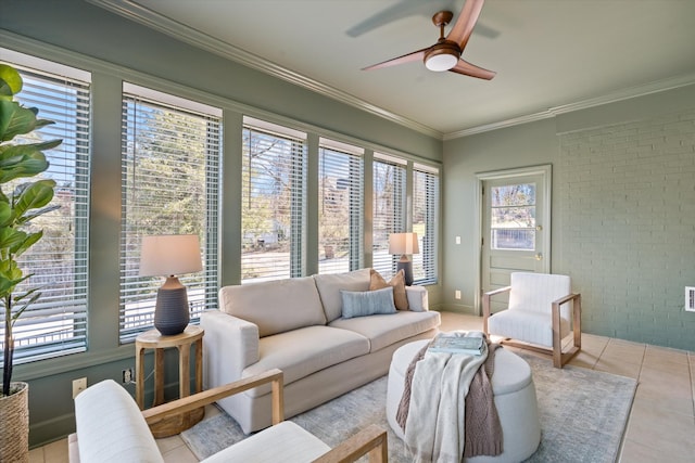 sunroom featuring ceiling fan