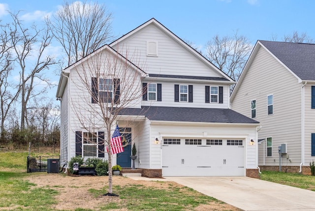 view of front of house featuring driveway, a front lawn, an attached garage, and cooling unit