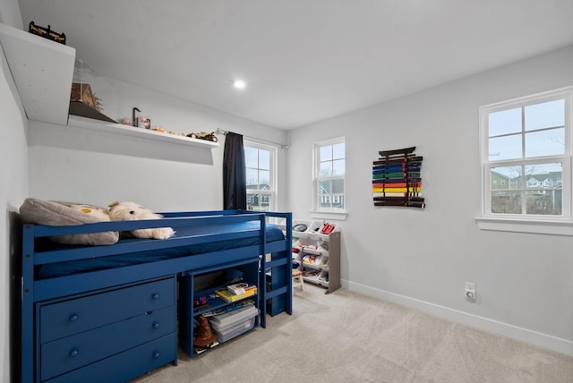 bedroom featuring recessed lighting, baseboards, and light colored carpet