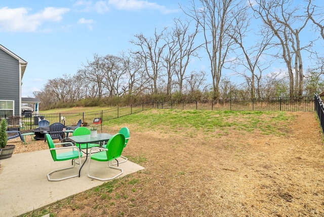 view of yard with a patio area and a fenced backyard