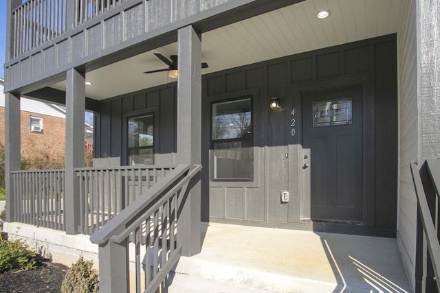 entrance to property featuring a porch and board and batten siding