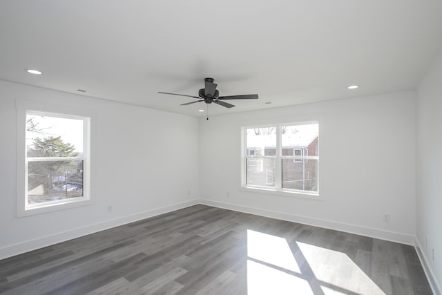 unfurnished room with a ceiling fan, baseboards, wood finished floors, and recessed lighting