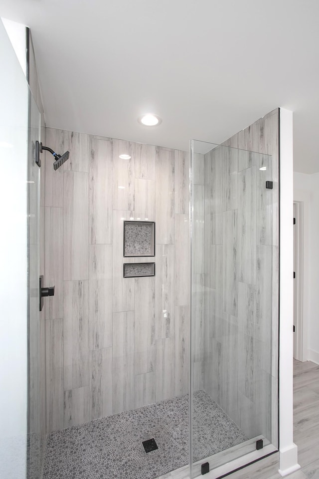 full bathroom with a shower stall