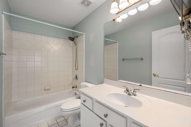 bathroom with shower / bath combination, visible vents, toilet, tile patterned flooring, and vanity