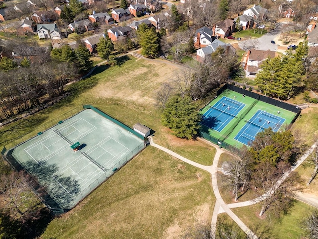 birds eye view of property with a residential view