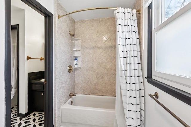 full bath featuring shower / tub combo with curtain