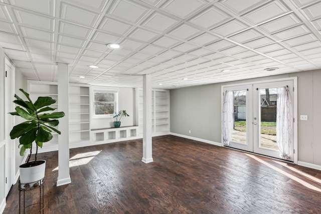 interior space featuring plenty of natural light, built in shelves, and french doors