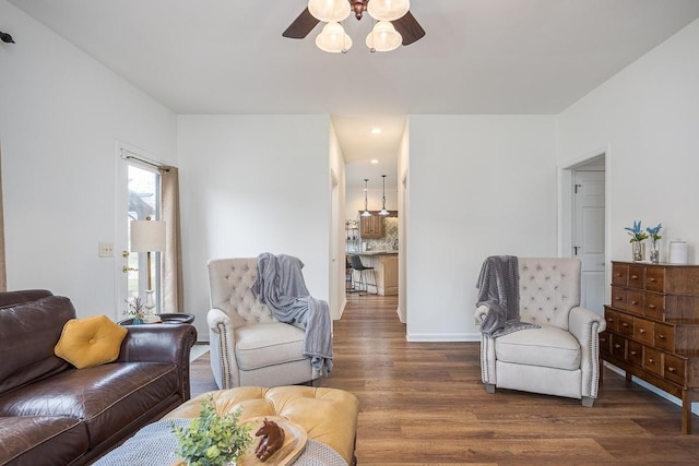 living area with ceiling fan, wood finished floors, and recessed lighting