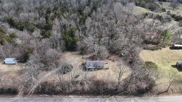 drone / aerial view with a view of trees