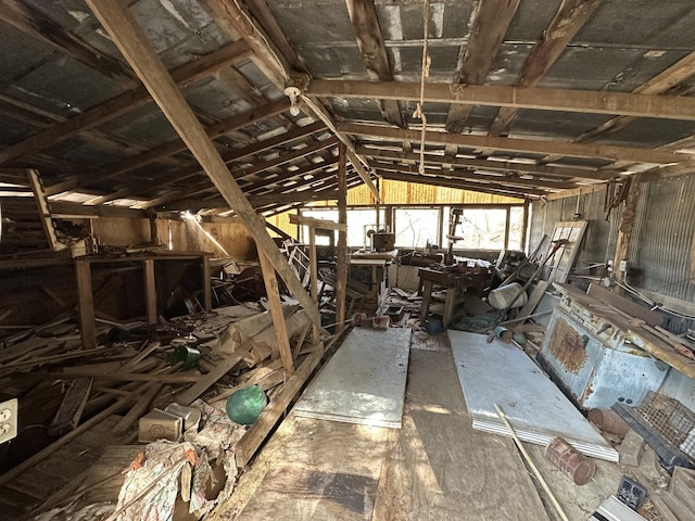 miscellaneous room featuring lofted ceiling