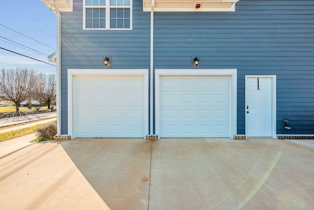 garage with driveway