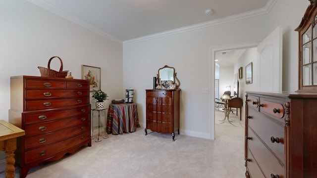 bedroom with baseboards, ornamental molding, and light colored carpet