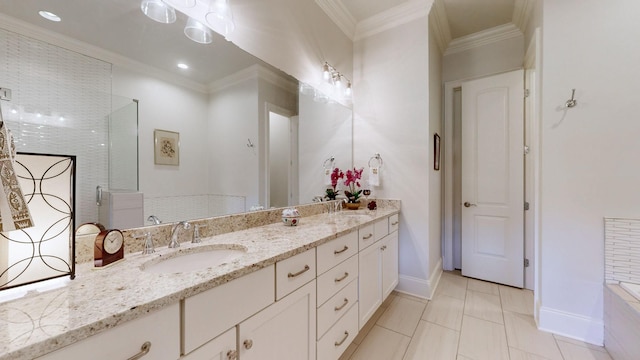 full bathroom with ornamental molding, a sink, baseboards, and double vanity