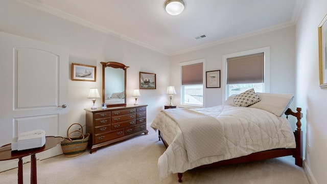 bedroom featuring carpet, visible vents, and ornamental molding