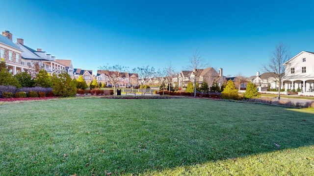 view of yard featuring a residential view