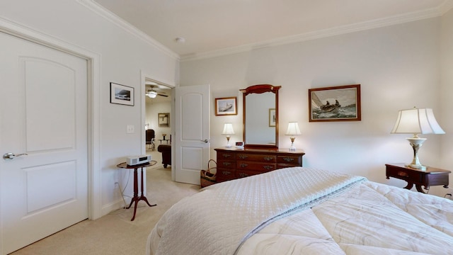 bedroom featuring light carpet, baseboards, and crown molding