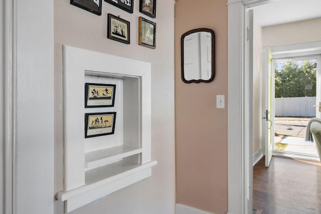 hallway featuring wood finished floors