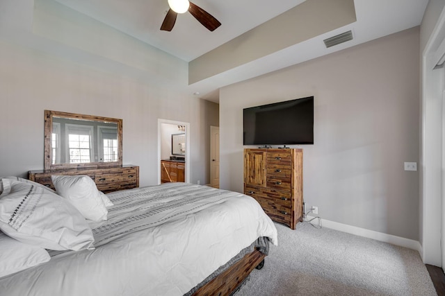 305 Seven Springs Way Unit 401, Brentwood, TN 37027 - carpeted bedroom featuring a ceiling fan, visible vents, baseboards, and ensuite bathroom