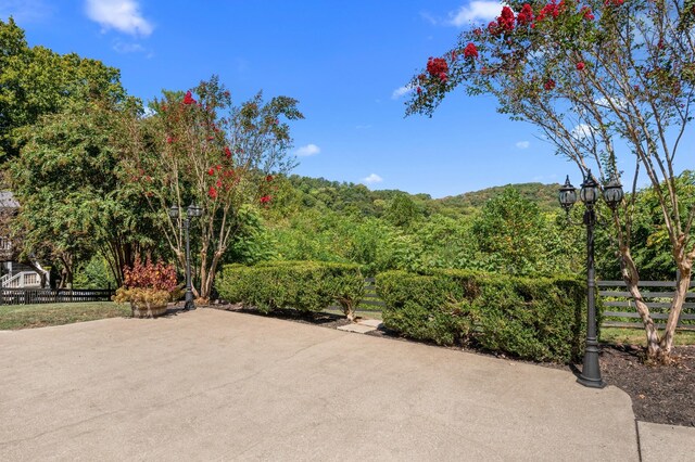 view of patio / terrace featuring fence