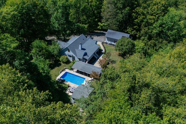 drone / aerial view with a forest view