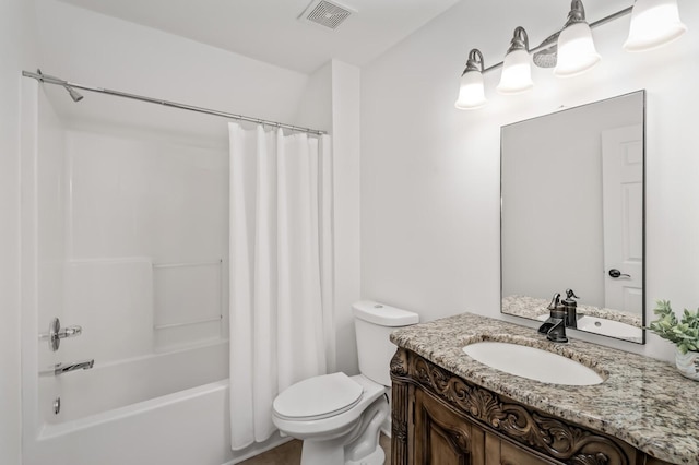 full bathroom featuring toilet, shower / bath combo, vanity, and visible vents