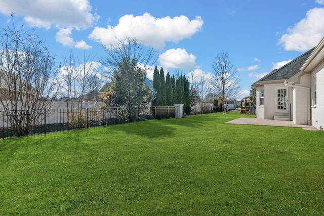 view of yard featuring a fenced backyard and a patio