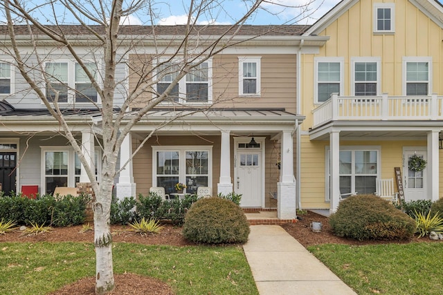 multi unit property featuring covered porch and board and batten siding