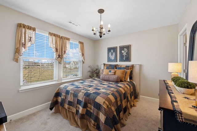 carpeted bedroom featuring an inviting chandelier, visible vents, and baseboards