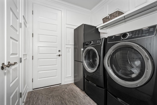 laundry room featuring laundry area and separate washer and dryer