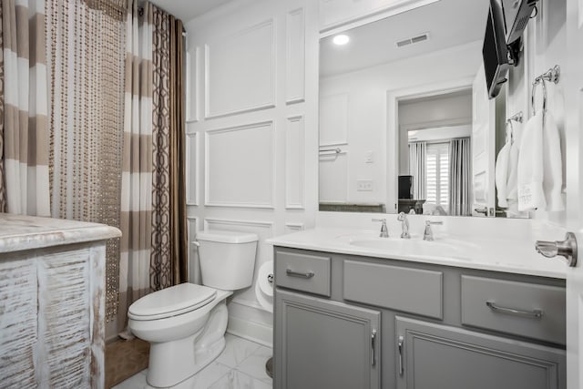 full bathroom with marble finish floor, curtained shower, visible vents, toilet, and vanity