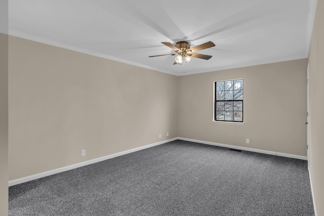 unfurnished room featuring ceiling fan, carpet, visible vents, and baseboards