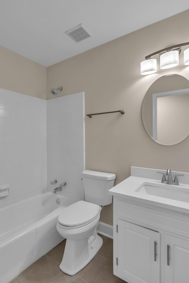 bathroom with toilet, tile patterned flooring, visible vents, and vanity