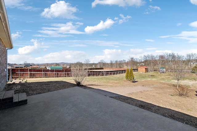 exterior space featuring a patio area and a fenced backyard