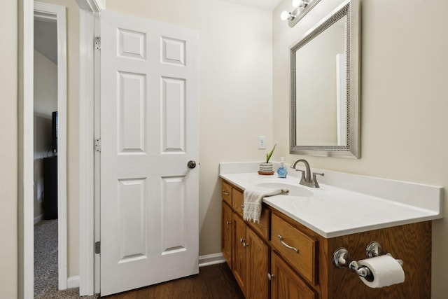 bathroom featuring vanity and baseboards