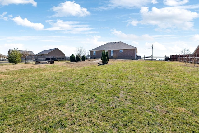 view of yard with fence