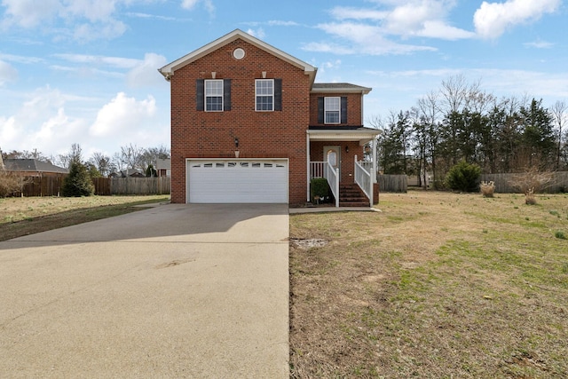 traditional-style home featuring a garage, brick siding, fence, driveway, and a front yard