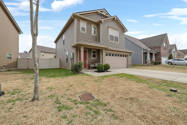 view of front of home with a garage, concrete driveway, a front lawn, and fence