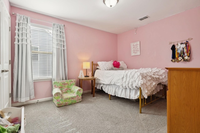 bedroom featuring carpet, visible vents, and baseboards