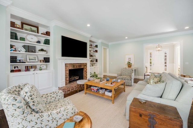 living area featuring recessed lighting, baseboards, built in features, a brick fireplace, and crown molding