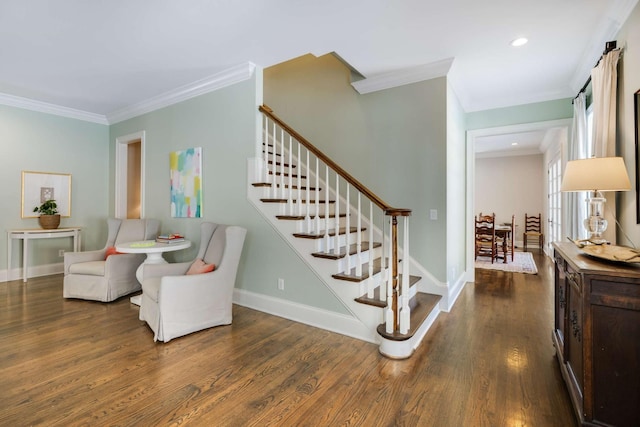 interior space featuring stairs, baseboards, and wood finished floors