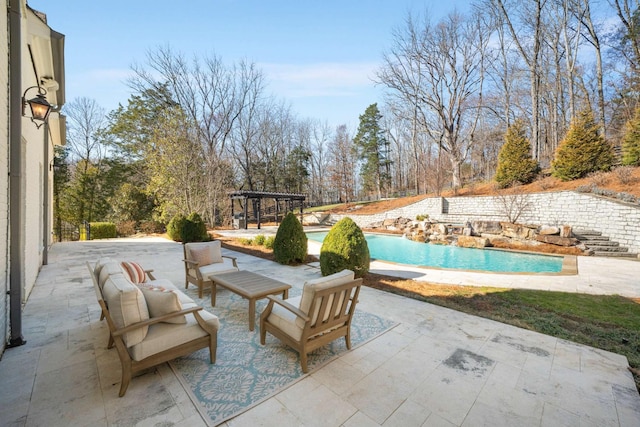 view of patio / terrace featuring an outdoor pool and a pergola