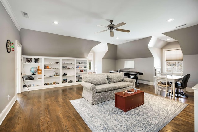 living room featuring ceiling fan, vaulted ceiling, visible vents, and dark wood finished floors