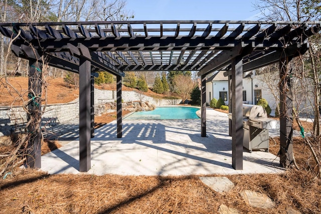 view of patio / terrace with an outdoor pool and a pergola