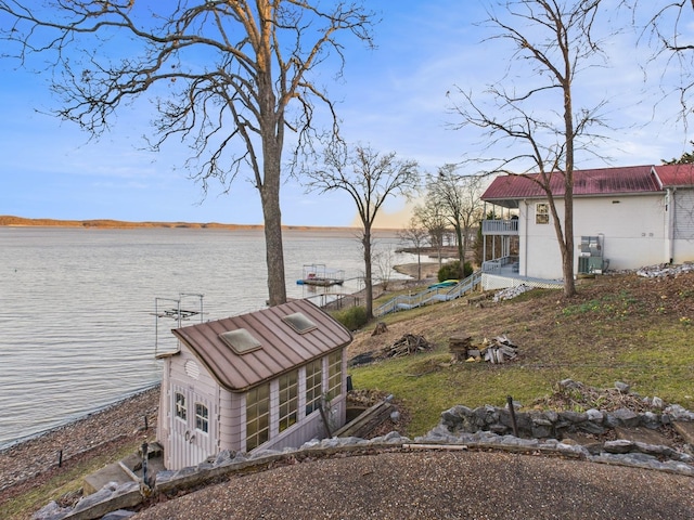 dock area featuring a water view