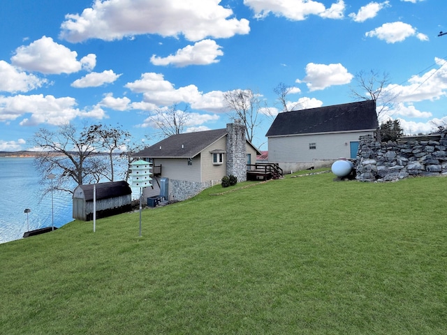 view of yard with a water view